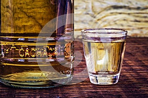 Detail of a bottle of cachaÃ§a, a typical Brazilian drink. Brazilian product for export, distilled drink known as aguardente or