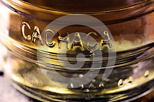 Detail of a bottle of cachaÃ§a, a typical Brazilian drink. Brazilian product for export, distilled drink known as aguardente or