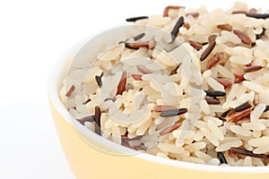 Detail of bowl with cooked rice of various types