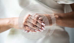 Detail of bride with perfect fingernails manicure done is ready for her wedding day