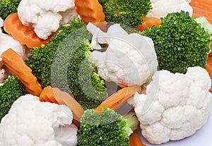 detail of broccoli, carrot and cauliflower