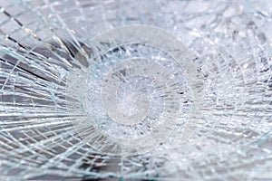 Detail of a broken glass of a window