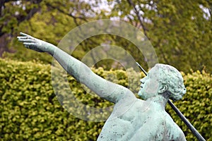 Bronze statue of female javelin thrower photo
