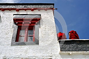 Detail of a Buddhist temple with two monks