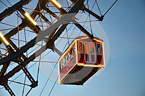 Detail of cabin Vienna giant wheel illuminated in winter christmas