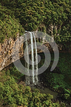Detail of Caracol waterfall falling from a cliff