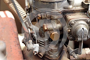 Detail of the carburettor of an old car