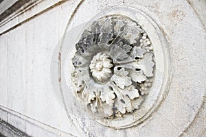 Detail of a carved circular stone flower