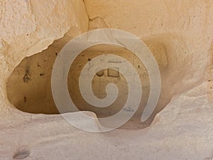 Detail from carved stone caves in magnificent stone structures near Goreme, Cappadocia, Anatolia