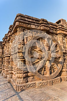Detail carving of a stone wheel at ancient Hindu Sun Temple, Konark, India. UNESCO World Heritage.