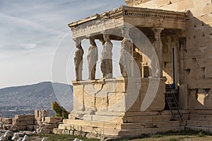 Detail of caryatids statues on the Parthenon on Acropolis Hill, Athens, Greece. Figures of the Caryatid Porch of the Erechtheion