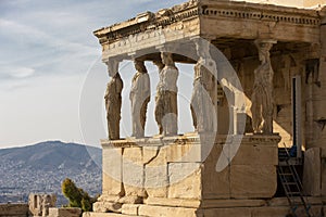 Detail of caryatids statues on the Parthenon on Acropolis Hill, Athens, Greece. Figures of the Caryatid Porch of the Erechtheion