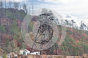 Detail of Castillete a metallic structure in the shape of a tower in the abandoned mine of copper, gold and silver in PeÃÂ±a de photo