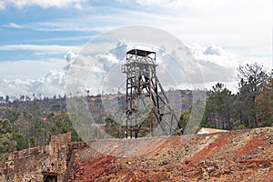 Detail of Castillete a metallic structure in the shape of a tower in the abandoned mine of copper, gold and silver in PeÃÂ±a de photo