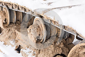 Detail of caterpillar track in construction site