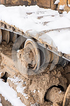 Detail of caterpillar track in construction site