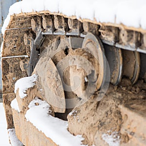 Detail of caterpillar track in construction site