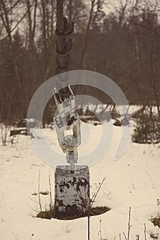 Detail of caterpillar track in construction site - aged photo