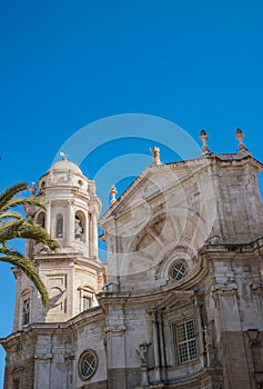 Detail of the Cathedral of La Santa Cruz of Cádiz with bell tower and concave shape above, SPAIN
