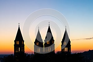 Detail of cathedral towers with sunrise