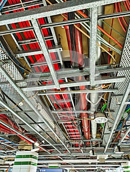 Detail of Cables, Conduits and Steel Brackets in Ceiling photo