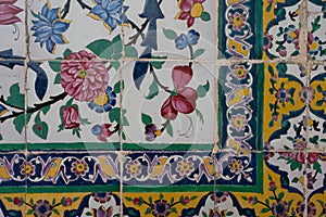 Detail of ceramic tiles with islamic floral ornaments. Floral patterns of Shia islam, Shiraz, Iran. photo