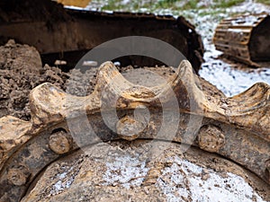 Detail of chain gear of  tracked vehicle. Crawler tracks hydraulics on a tractor