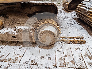 Detail of chain gear of  tracked vehicle. Crawler tracks hydraulics on a tractor