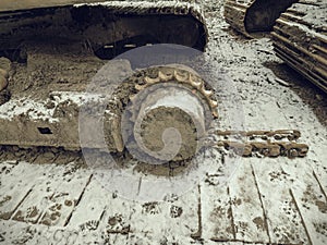 Detail of chain gear of  tracked vehicle. Crawler tracks hydraulics on a tractor