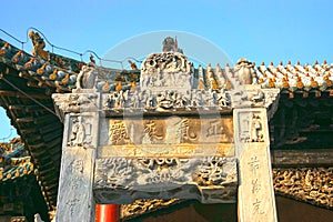 Detail of chinese ancient stone decorated archway in Henan, China.