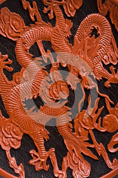 Detail of Chinese saucer wit red dragon