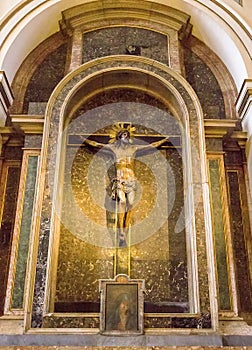 Detail of Christ Crucifixtion Statue Inside basilica of the Virgen del Pilar, Zaragoza, Aragon, Spain.