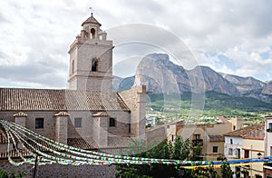 Detail of the church of Polop de Marina with mountainrange, Costa Blanca, Spain