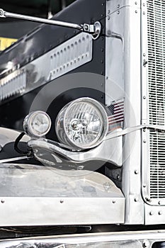 Detail of classic american truck headlight and radiator lamp.