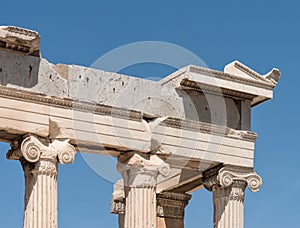 Detail of classical greek architecture, Ionic columns from Acropolis, Athens, Greece