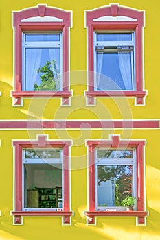 detail of classicistic window at house facade
