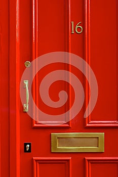 Detail Close-up of a Bright Red Door in London England