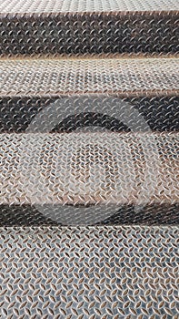Detail and close-up of contemporary engraved metal stairs
