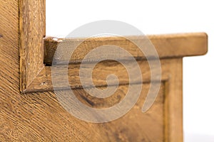 Detail close-up image of wooden oak stairs in house interior