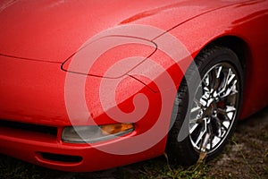 Detail of a Closed Headlight on a 2000 Chevrolet Corvette