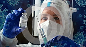 Detail closeup of syringe needle and ampoule , nurse taking injection shot,hands in blue protective gloves holding