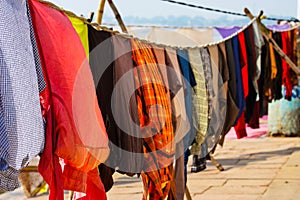 Detail of clothes hung out to dry on the banks of the gange in Varanasi