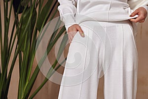 Detail of clothes woman beautiful sexy  wear white cotton knitted suit fashion style for casual collection accessory interior sand