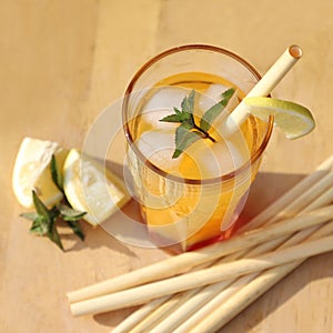Detail of coctail with bamboo reed straws