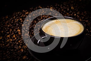 Detail coffe cup with coffee beans