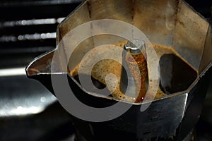 Making espresso in an Italian coffee maker photo