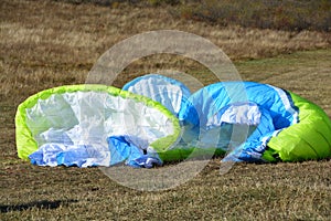 Detail of colorful bright parachute on the ground