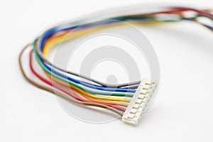 Detail of a colorful cables connector isolated on white