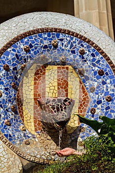 Detail of colorful mosaic work of Park Guell. Barcelona of Spain