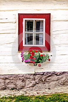 Detail of colorful window on old traditional house